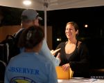 Observers check in with Tournament Director Ashley Bretecher. Photo Credit: Pepper Ailor 